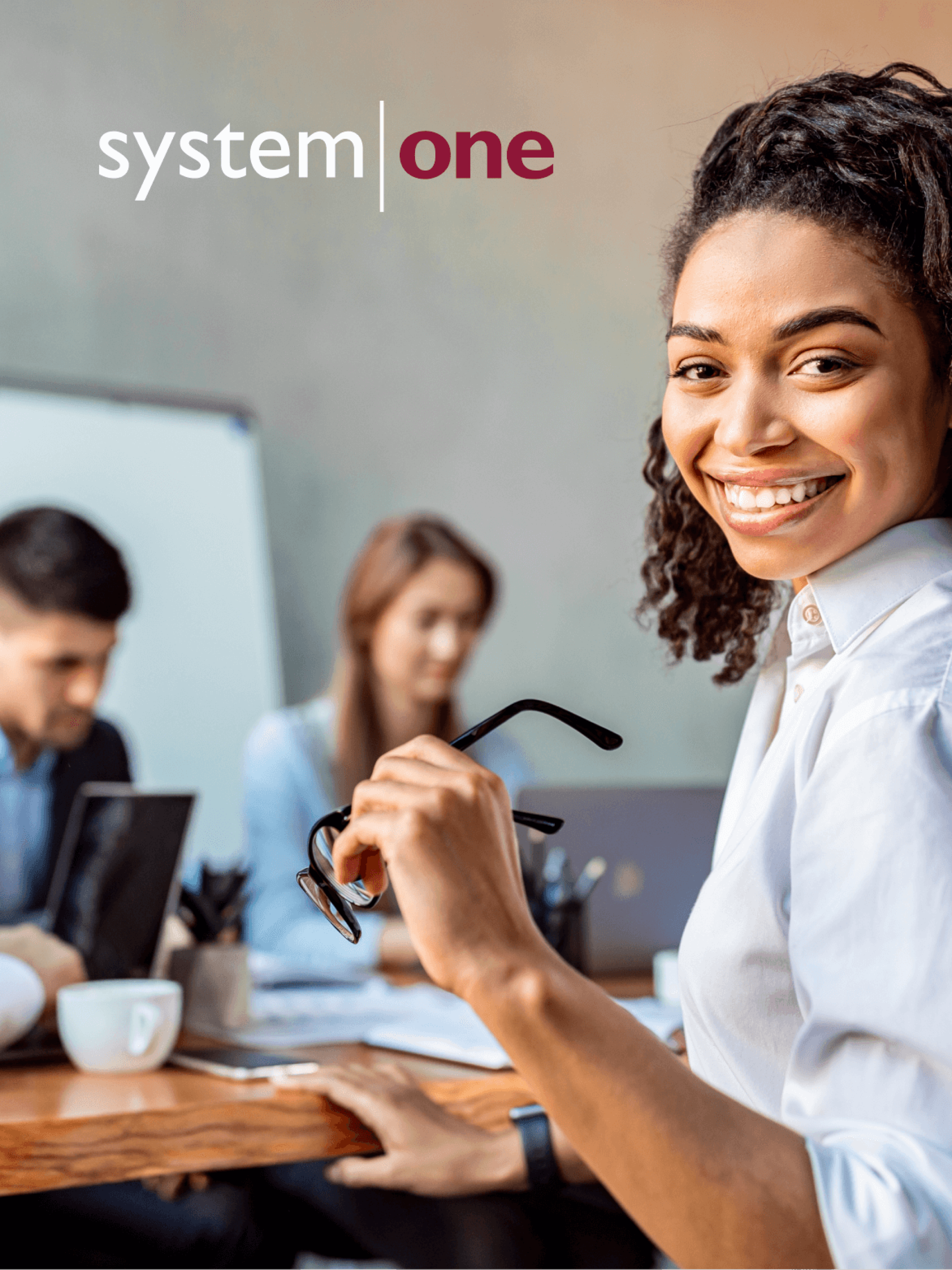 System One logo on image of smiling woman
