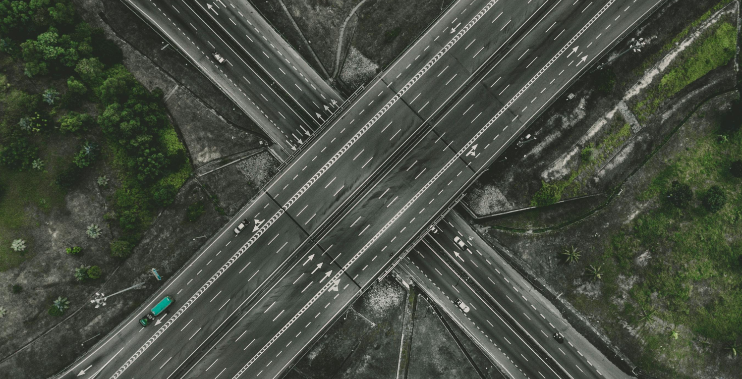 Overhead view of multiple lane highway overpasses